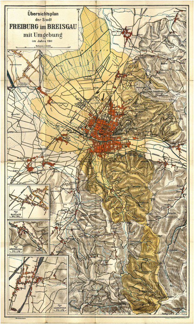 Ein detaillierter alter Stadtplan von Freiburg, Deutschland, mit Text oben und unten, der Straßen, Gebäude und Sehenswürdigkeiten zeigt.