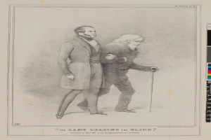 Zwei Männer stehen nebeneinander auf einem Papier mit Text und Farbskalen, einer hält einen Stock, mit dem Text "Der Weg des Blinden" auf dem Papier geschrieben.