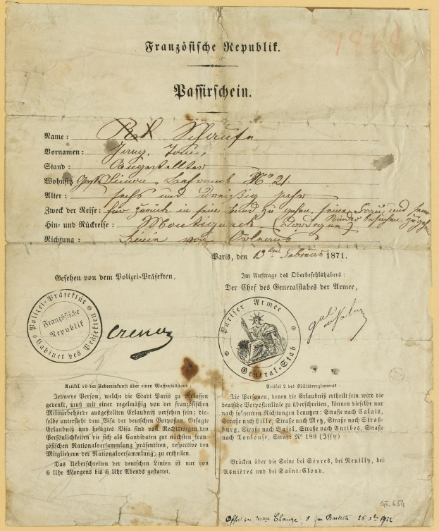 Altes deutsches Regierungsdokument mit einem kreisförmigen, schwarz umrandeten Stempel auf gelbem Papier, das schwarze Schrift enthält.